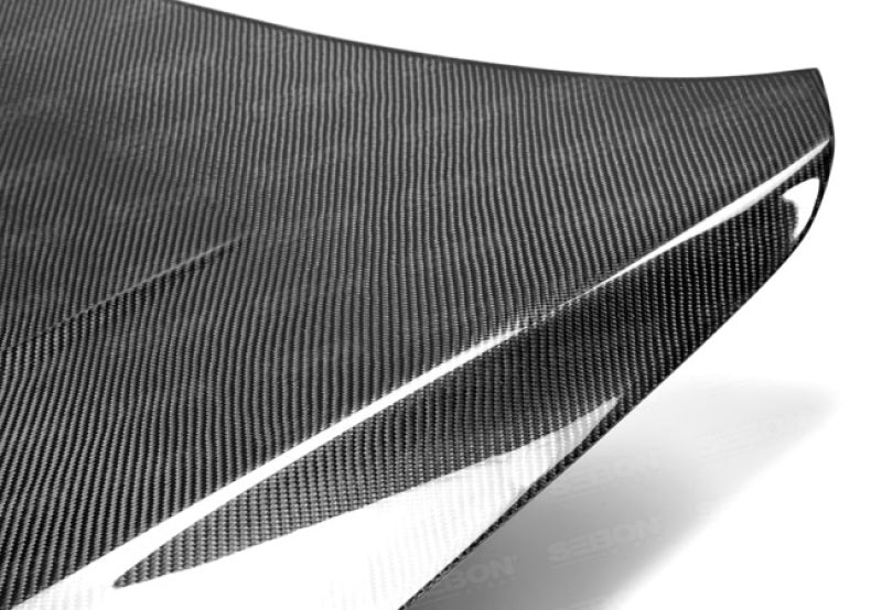 Seibon 08-12 Mitsubishi Lancer Evo X DV-Style Carbon Fiber Hood Main image