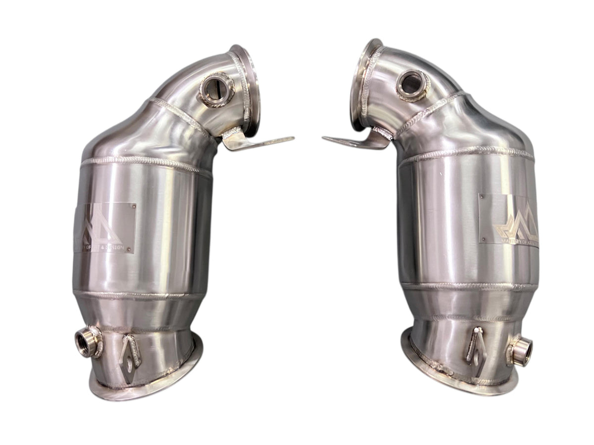 MAD BMW F9x M5 M8 Catted Downpipes W/ No CEL Guarantee Main image