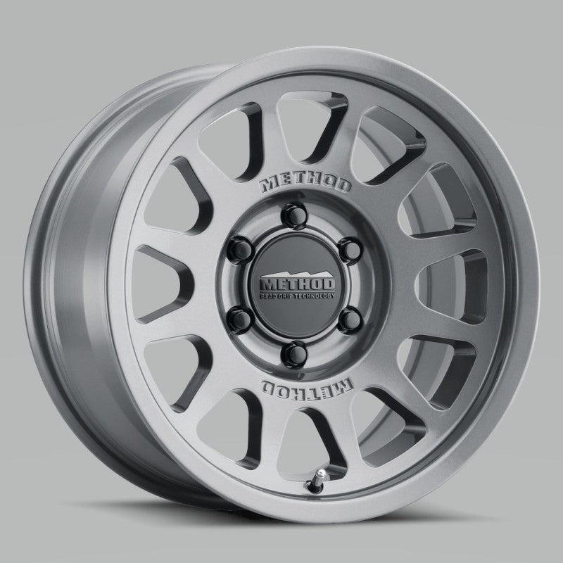 Method MR703 17x8.5 0mm Offset 6x135 87mm CB Gloss Titanium Wheel Main image